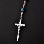 Rosary necklace laid flat showing the chain length and pendant drop for prayer beads