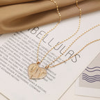 Close-up view of gold electroplated pendant with religious pattern
