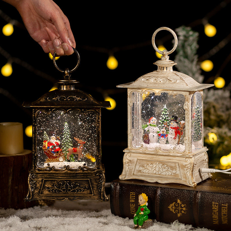 Christmas decorative music box with swirling snow scene and warm lighting