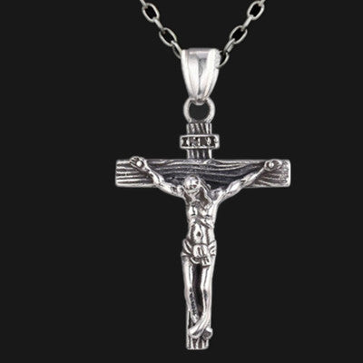Easter faith jewelry: Jesus cross pendant on display