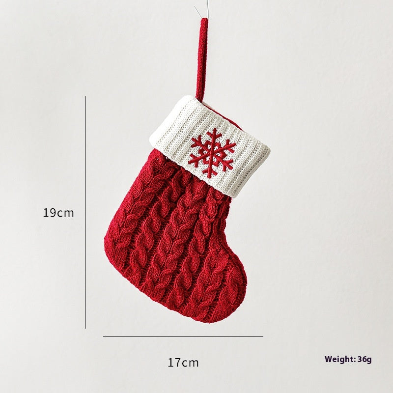 Gold bell trimmed Christmas stocking with cozy cloth texture