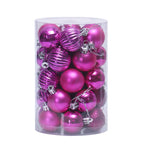 Glossy plastic Christmas ornaments in gold and silver tones