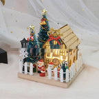 Wooden forest cottage Christmas decoration with soft LED glow