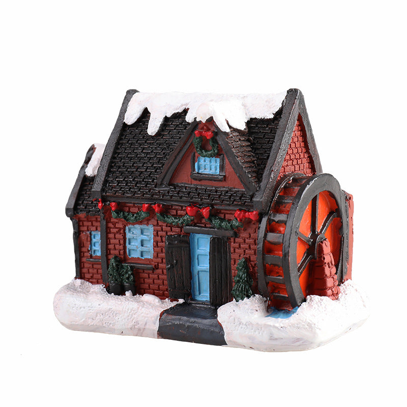 Miniature Christmas house resin ornament with festive details