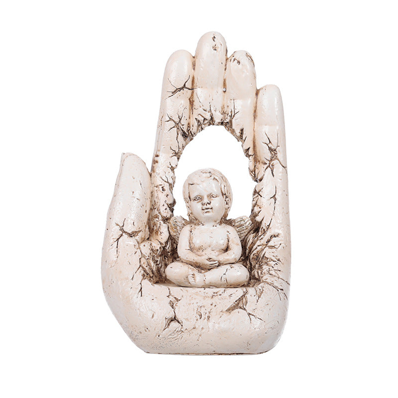 Close-up of textured resin craft depicting sacred prayer moment with palm imagery