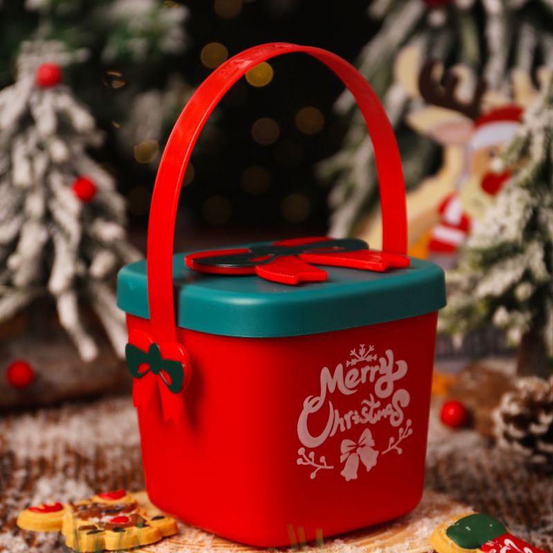Festive green Christmas tote bag with snowman motif for holiday fruit baskets