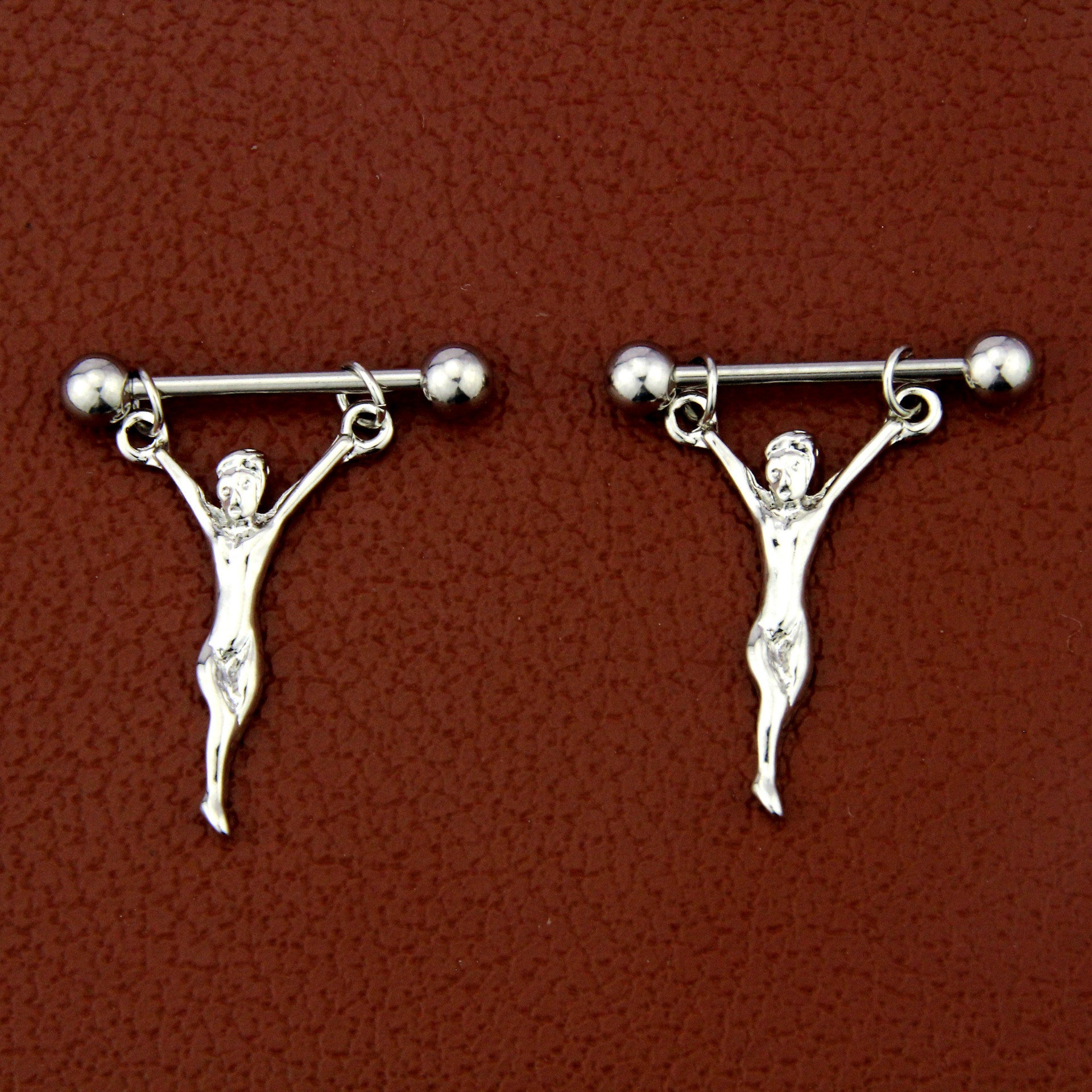 Body jewelry nipple ring with religious Christian symbol