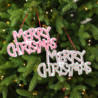 Holiday ornament displaying Merry Christmas greeting
