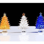 Gold crystal Christmas tree ornament catching warm light
