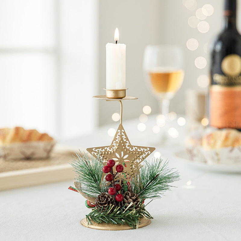 Wrought iron golden candlestick with star motif for Christmas decor