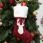 Red and black Christmas sock gift bag with snowflake design