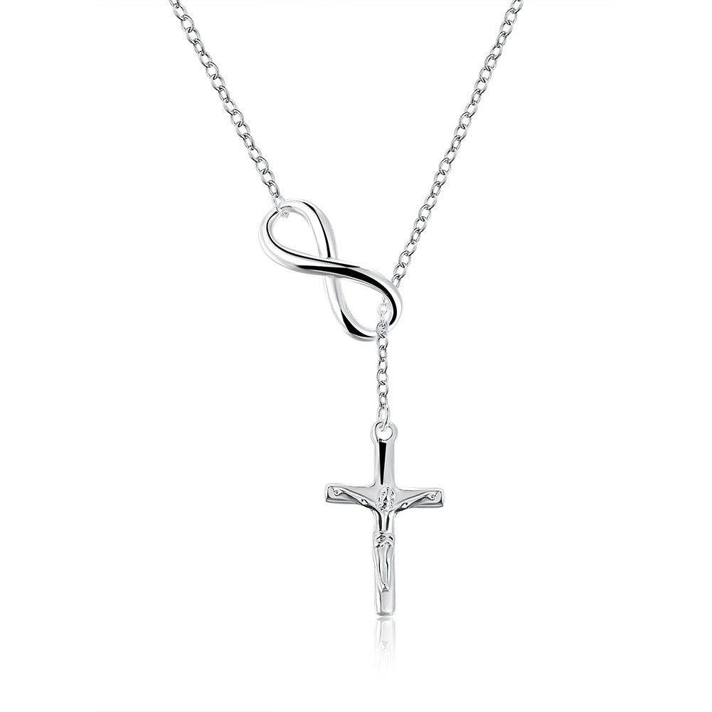 Cross pendant displayed against light background