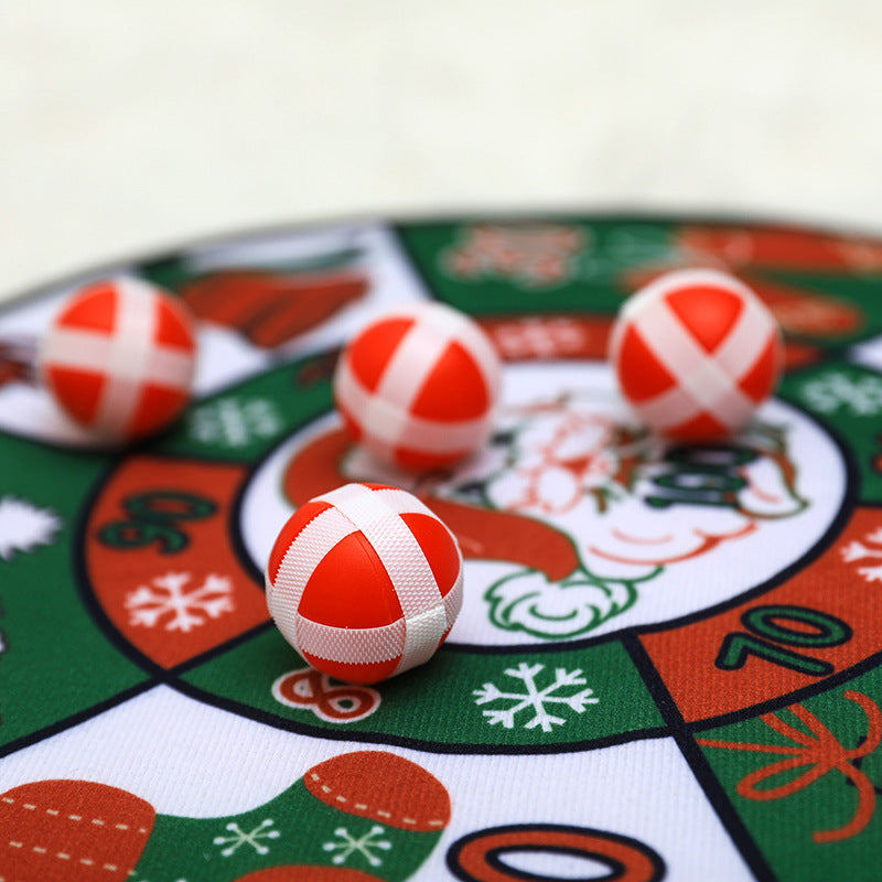 Family playing with Christmas ball dart throwing game
