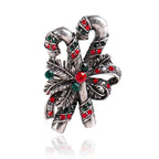 Christmas suit pin brooch displayed against dark background