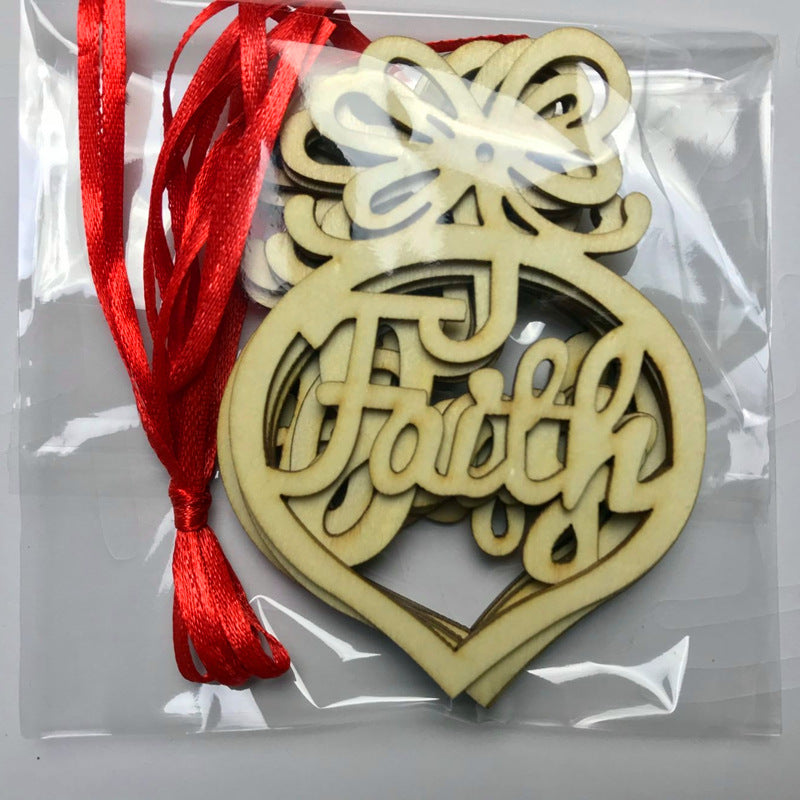 Close-up of wooden hollow pendant ornament showing intricate cutout design