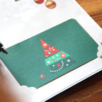 Christmas tree card featuring intricate hollow carving process