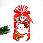 Set of holiday drawstring bags in festive colors