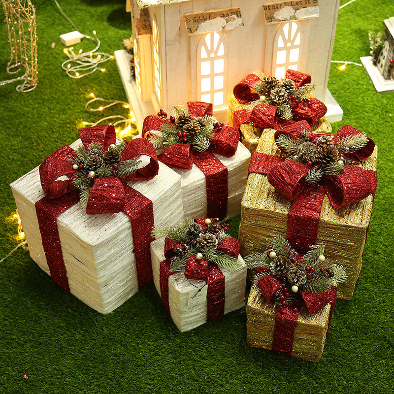 Iron gift boxes with Christmas tree design detail close-up