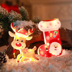 Festive Christmas string lights with holiday shapes displayed warmly