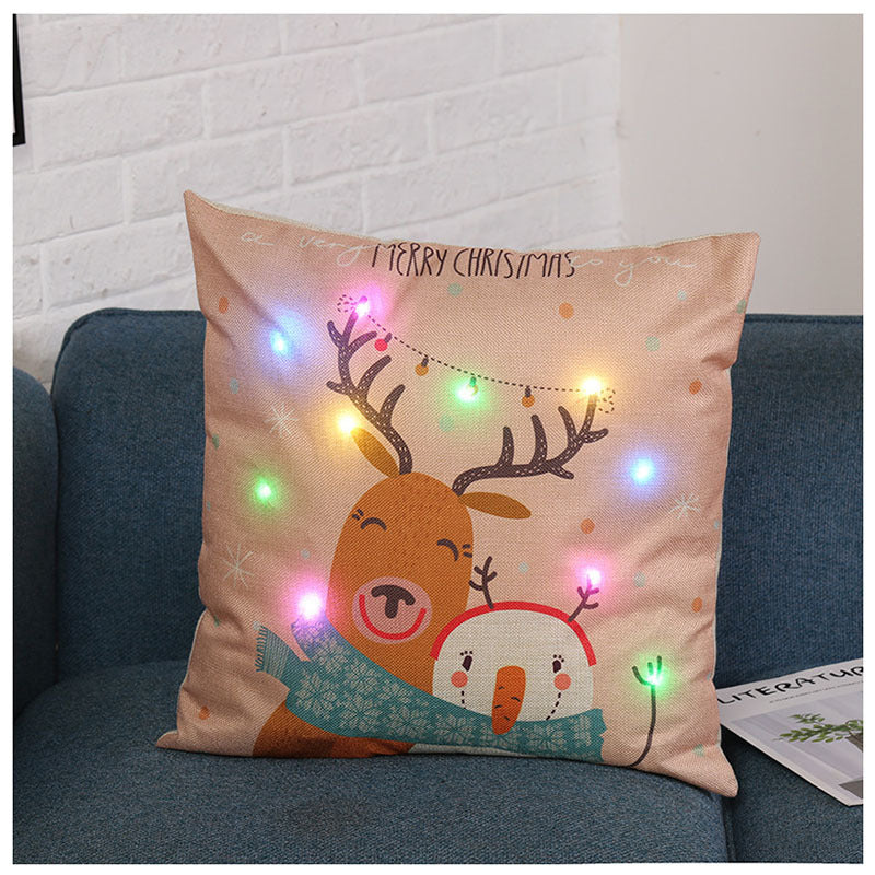 Holiday themed decorative pillow featuring Christmas cartoon imagery for cozy home atmosphere
