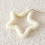 Set of faith-inspired Christmas tree ornaments with snowflake and star designs