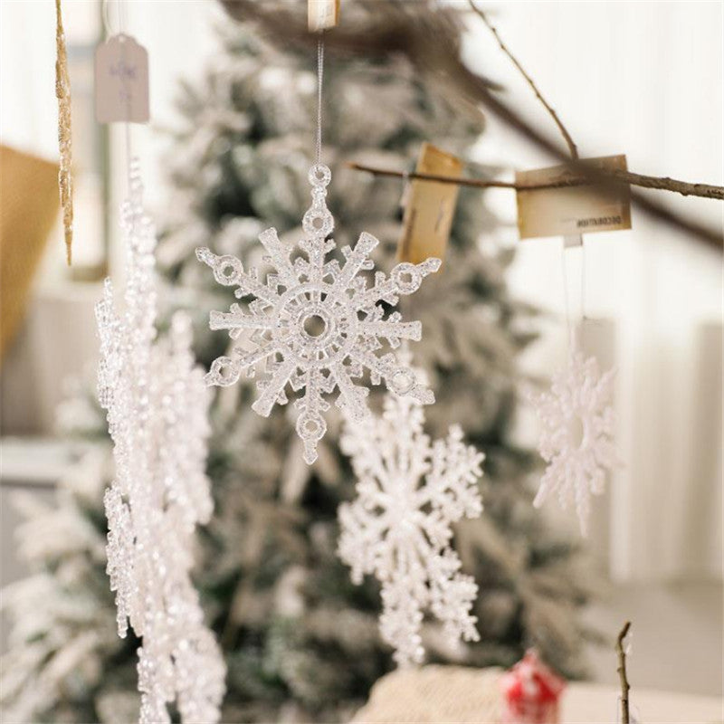 Close-up of clear acrylic snowflake ornament showing 3-D like crystal design