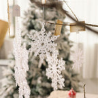 Close-up of clear acrylic snowflake ornament showing 3-D like crystal design