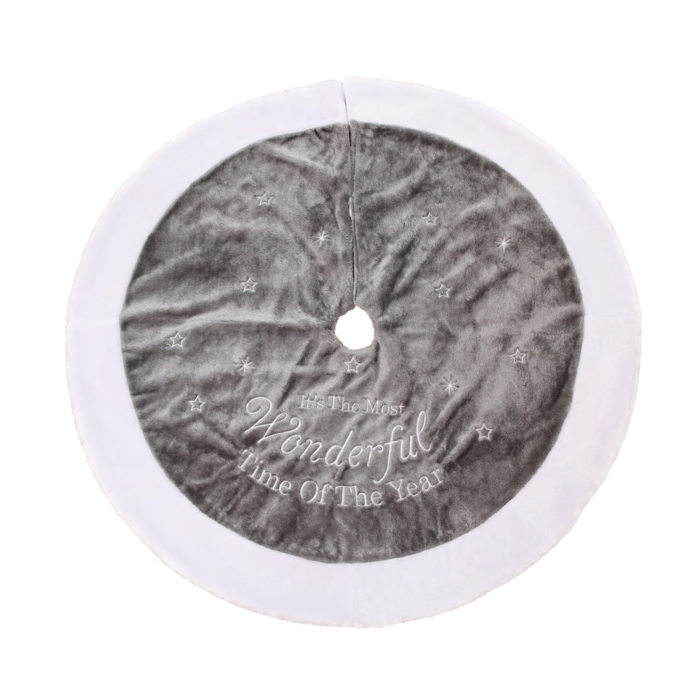 Holiday tree skirt featuring Christmas scene patterns for seasonal decorating