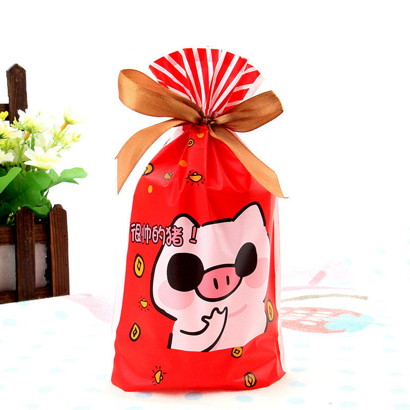 Multiple Christmas drawstring bags with holiday motifs