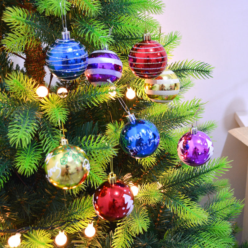 Electroplated Christmas ball ornaments in multiple colors hanging on a decorated tree