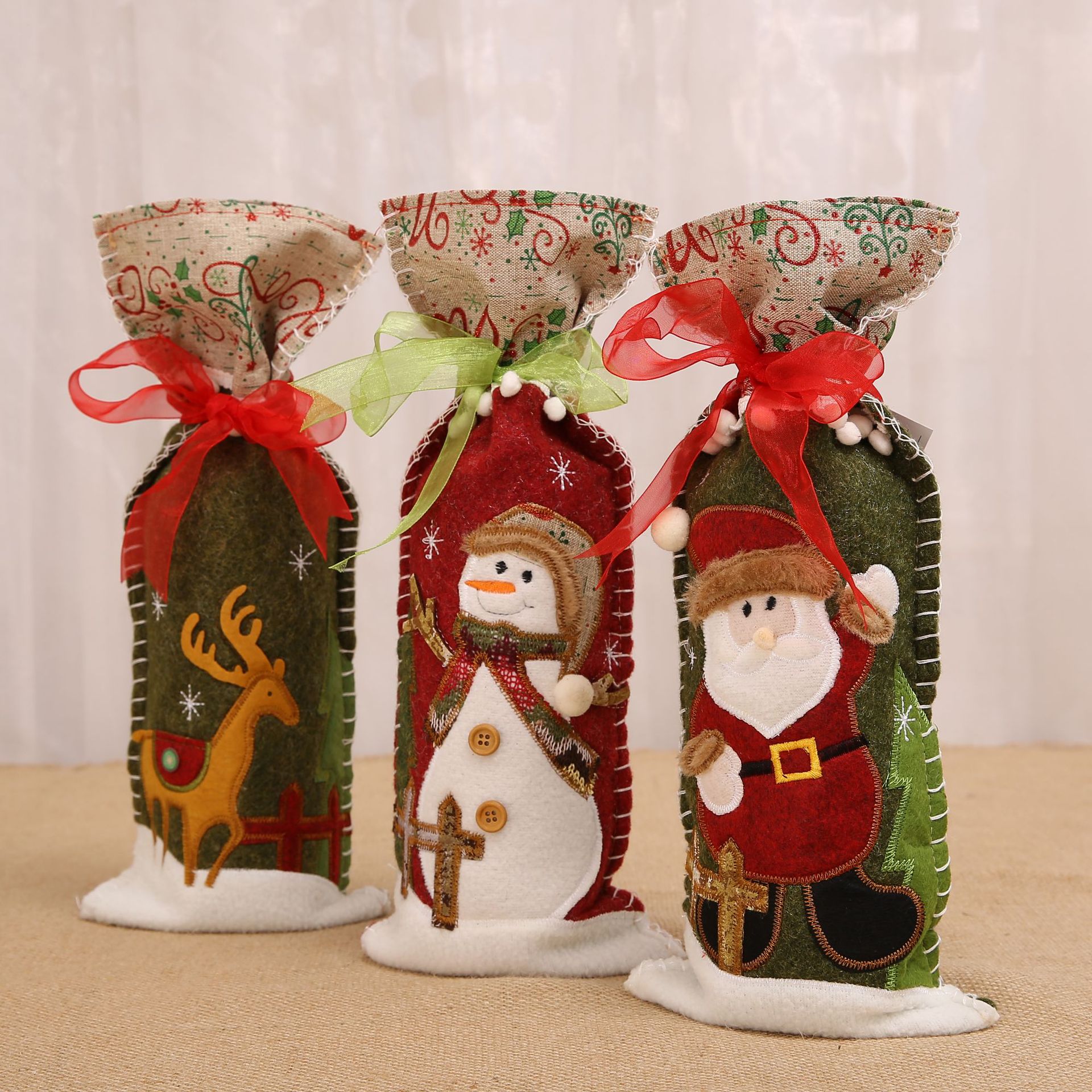 Cozy Christmas wine bottle decor with ribbon accents for festive home ambiance