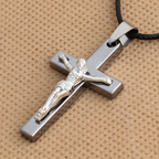 Crucifix pendant featuring the image of Christ on the cross