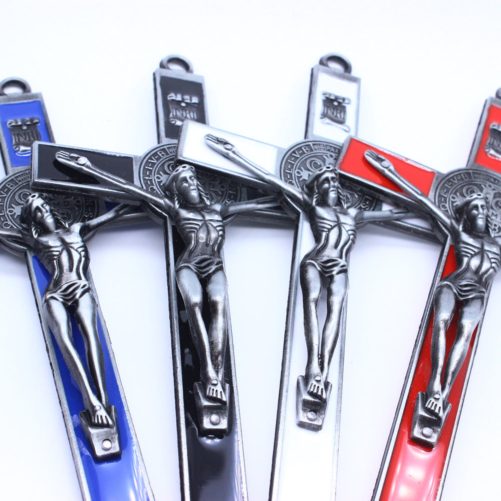 Detailed view of crucifixion scene on wall hanging cross
