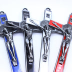 Detailed view of crucifixion scene on wall hanging cross