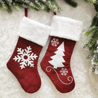 Set of Christmas sock gift bags in black and red colors for holiday gifting