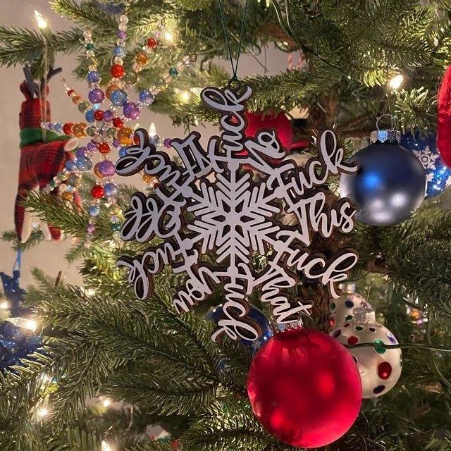Snowflake letter shape Christmas pendant with three-dimensional wooden design in festive holiday setting