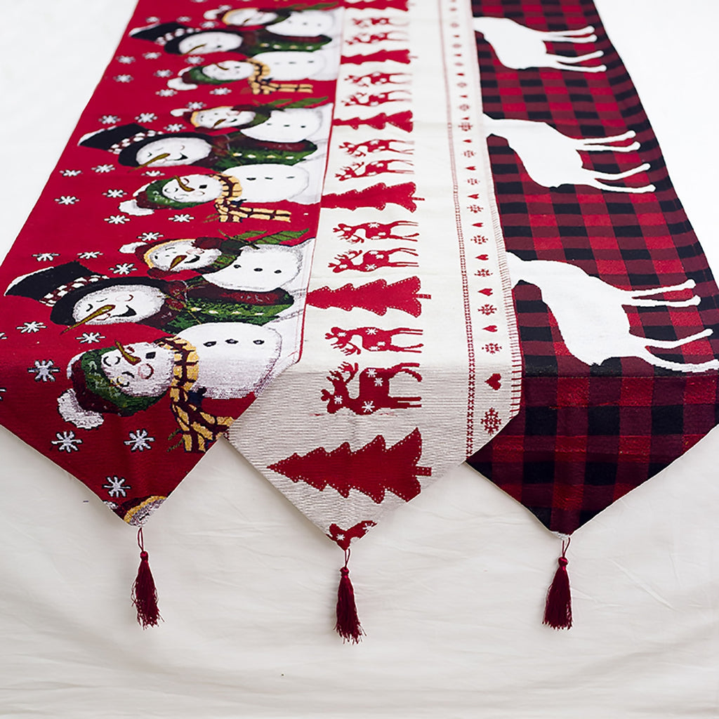 Charming Christmas table runner in warm tones featuring woodland and snowman motifs