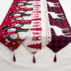 Charming Christmas table runner in warm tones featuring woodland and snowman motifs