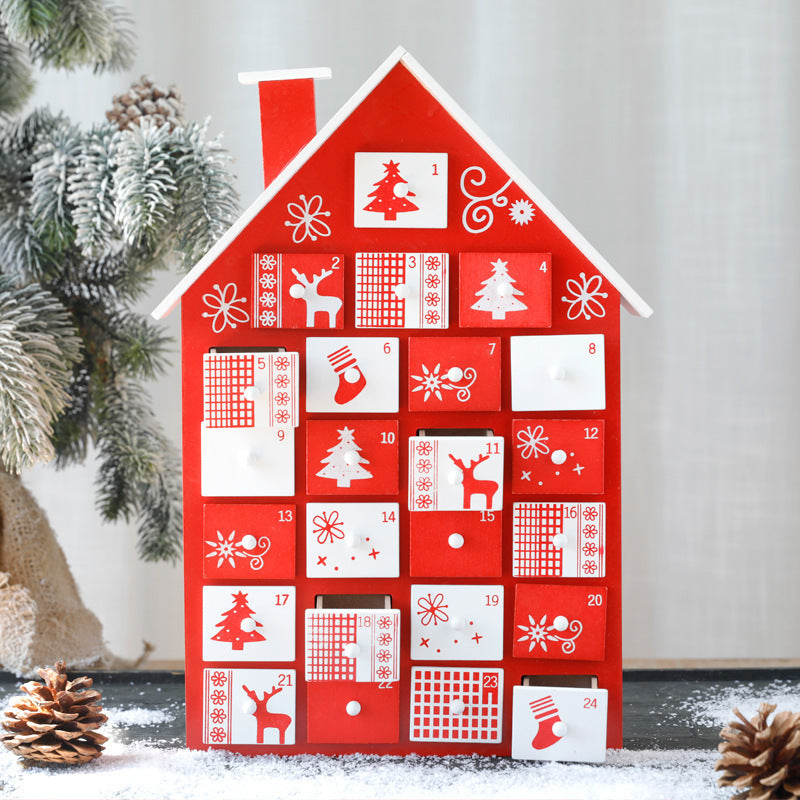 Advent calendar with traditional Christmas colors of red and green made from warm natural wood