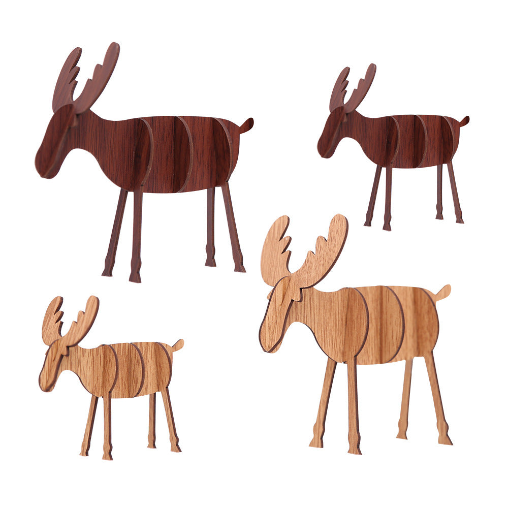 Close-up view of hand-carved wooden elk ornament with natural wood grain texture