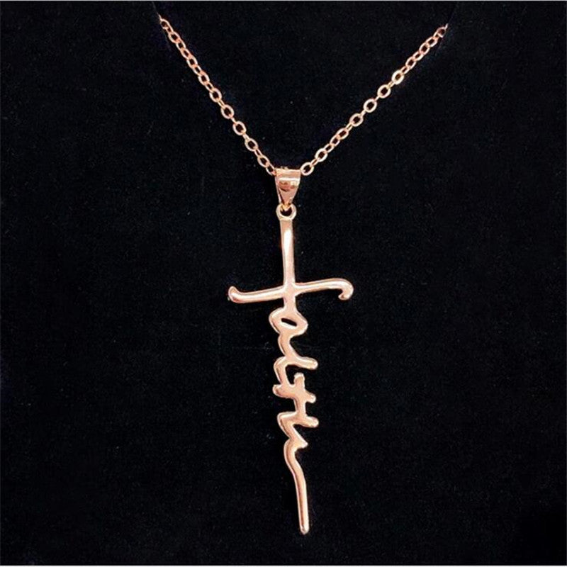 Silver-tone cross pendant close-up for religious jewelry store