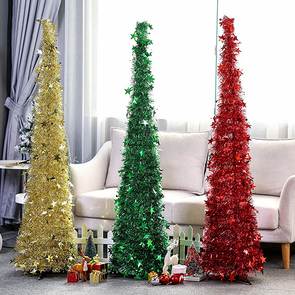 Beautiful sequin Christmas tree standing tall in home entryway
