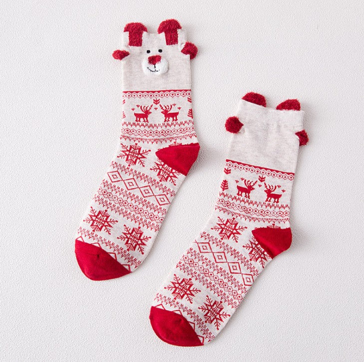 Festive Christmas socks featuring a cute Santa Claus design for women