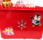 Electric Lift Christmas Music Gift Box on festive display surface