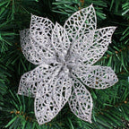 6-inch diameter Christmas glitter flower ornament displayed on green branches