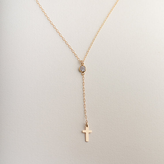 Small cross pendant necklace in gold and silver finish