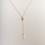 Small cross pendant necklace in gold and silver finish