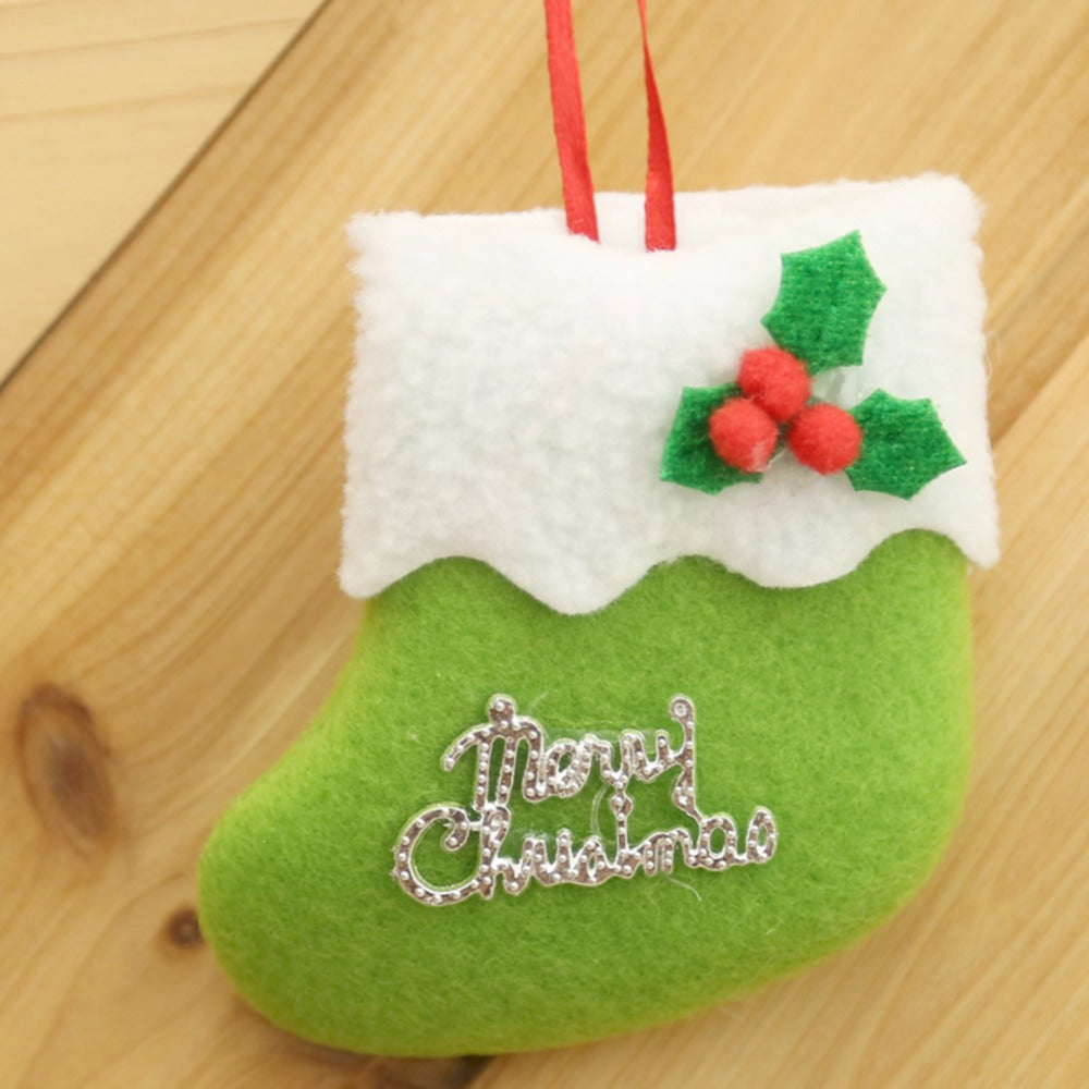 Green fabric Christmas stocking ornament for holiday tree display
