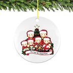 Christmas tree ornament pendant in festive holiday setting with red berries and greenery
