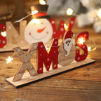 Wooden Christmas ornaments displayed on tree ready for gifting as meaningful faith-inspired Christmas gift